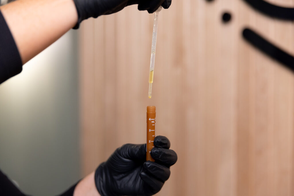 Close up of a medical provider at The Sonography Studio prepping for a hormone replacement therapy in Panama City.